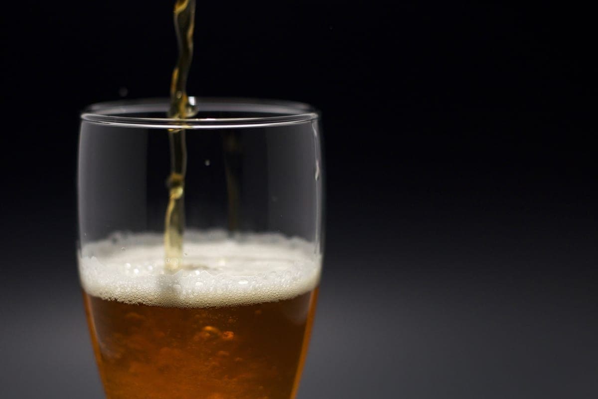 Close-up of beer foam on a glass