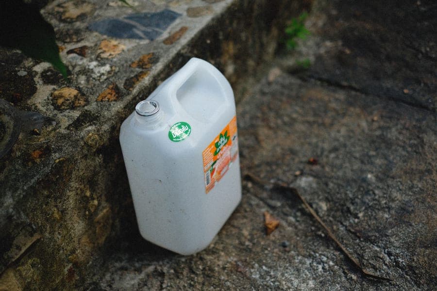 Plastic wide-mouth carboy with a screw cap