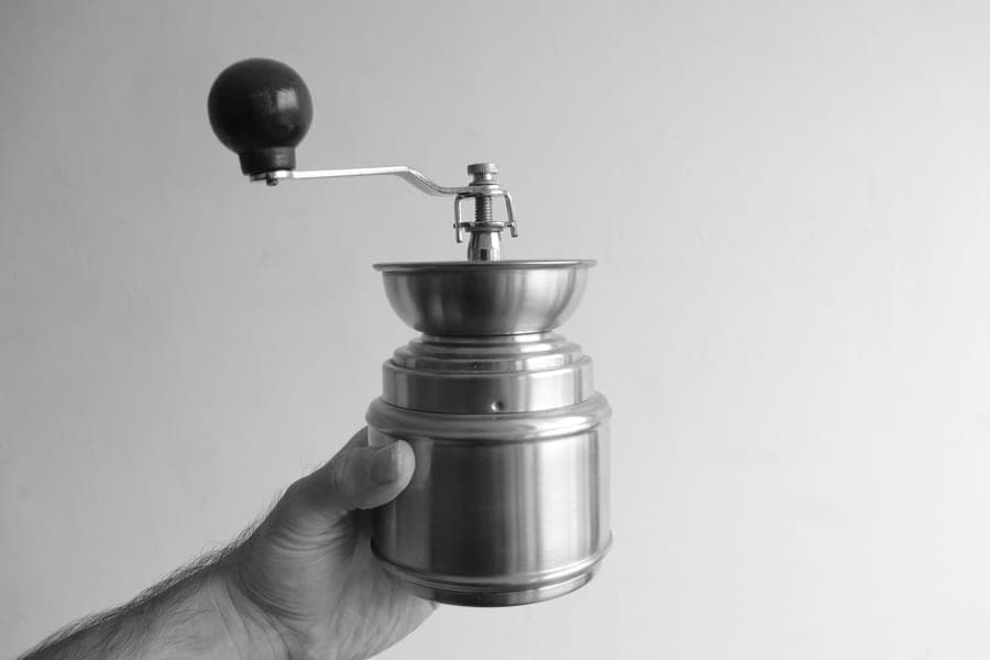 Two-roller grain mill clamped to a bucket